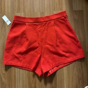 Orange Anthropologie shorts.  Size 10
